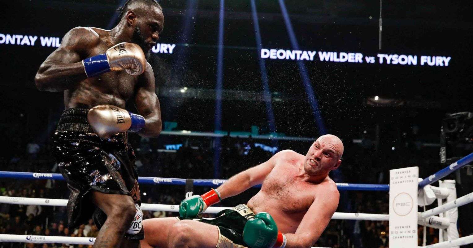 Wilder knocks Fury down